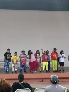 Group of young people with disabilities dancing on